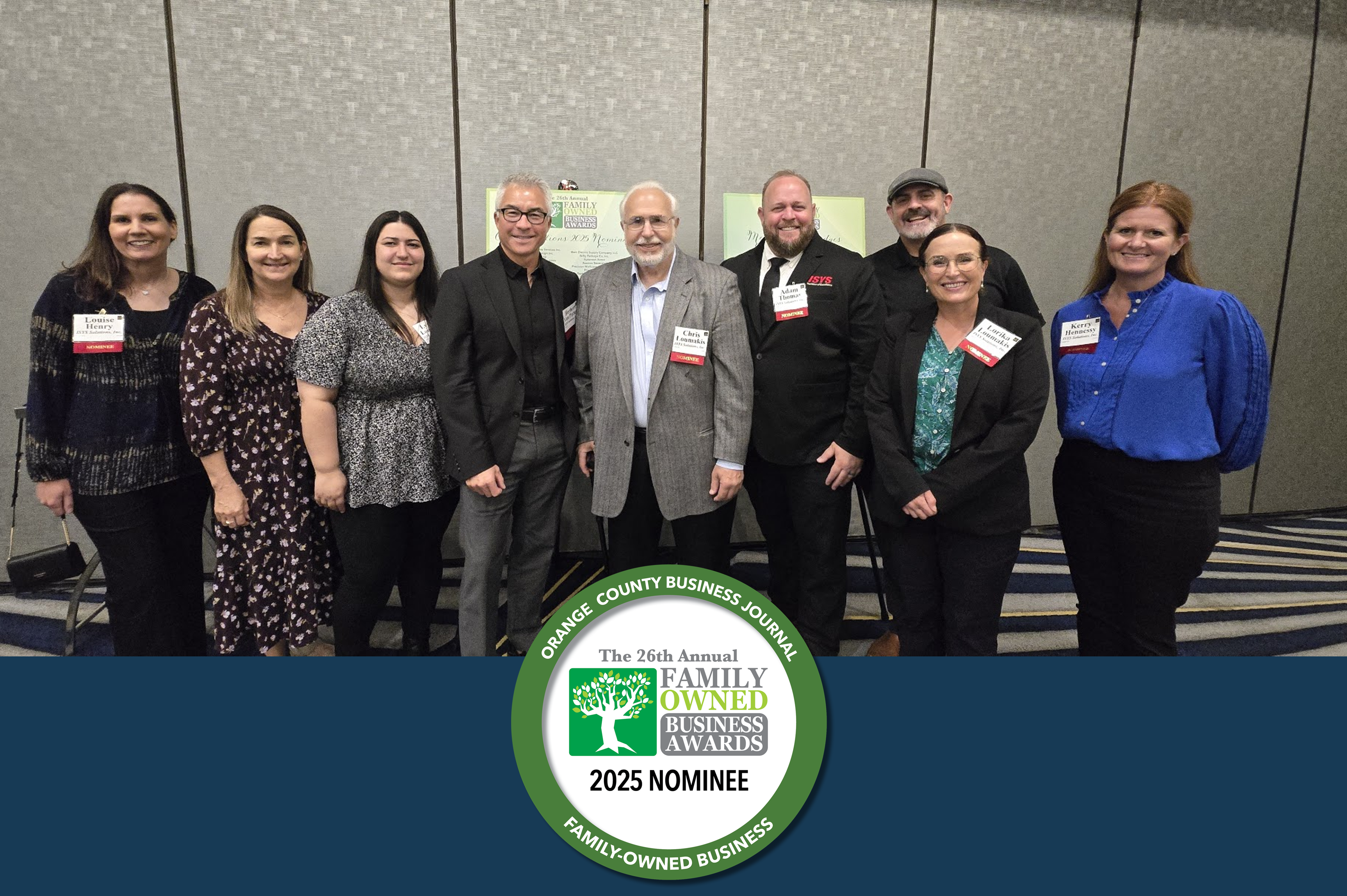 A group photo of nine ISYS® Solutions team members standing together at the 2025 Orange County Business Journal Family-Owned Business Awards. They are smiling in front of event signage. At the bottom of the image is a circular badge that reads: "Orange County Business Journal – The 26th Annual Family-Owned Business Awards – 2025 Nominee – Family-Owned Business."
