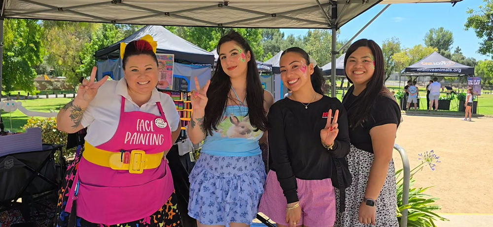 QC team with face painter
