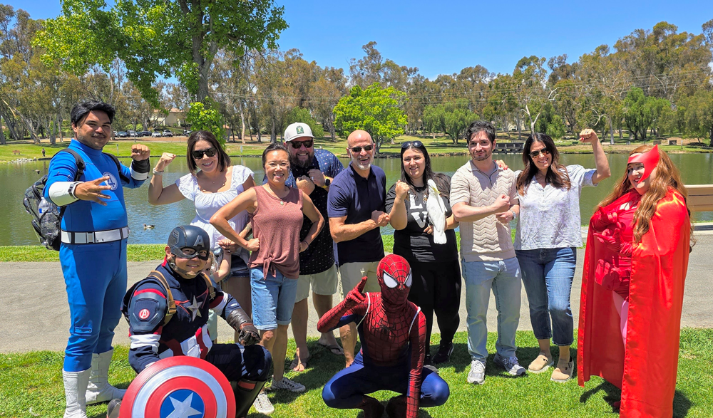 group photo of team ISYS with the Avengers