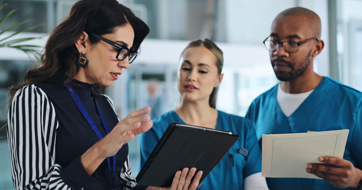 Nurse case manager coordinating care with healthcare professionals during a workers’ compensation claim